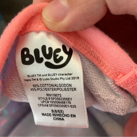 Bluey Girls purple and coral neon shorts romper with tropical flower print S6/6X - Picture 5 of 5